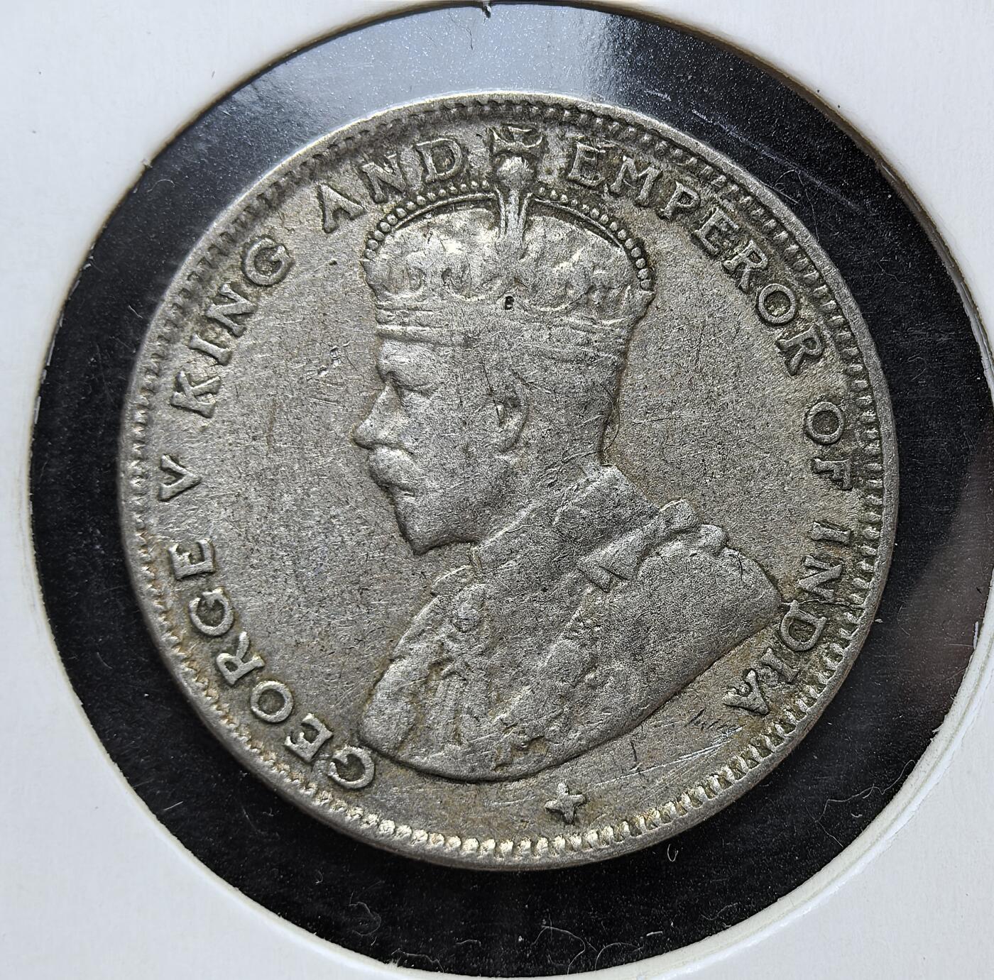 外国优质老铜币银币，正月十二晚九点倒数截拍，满百包邮可寄存，持续收拍 英属海峡殖民地1919年20分银币，正面为英王乔治五世像，背面标注面值。它发行于一战后殖民贸易恢复期，流通于新加坡、马六甲等港口，是英国殖民统治与东南亚贸易史的实物见证。