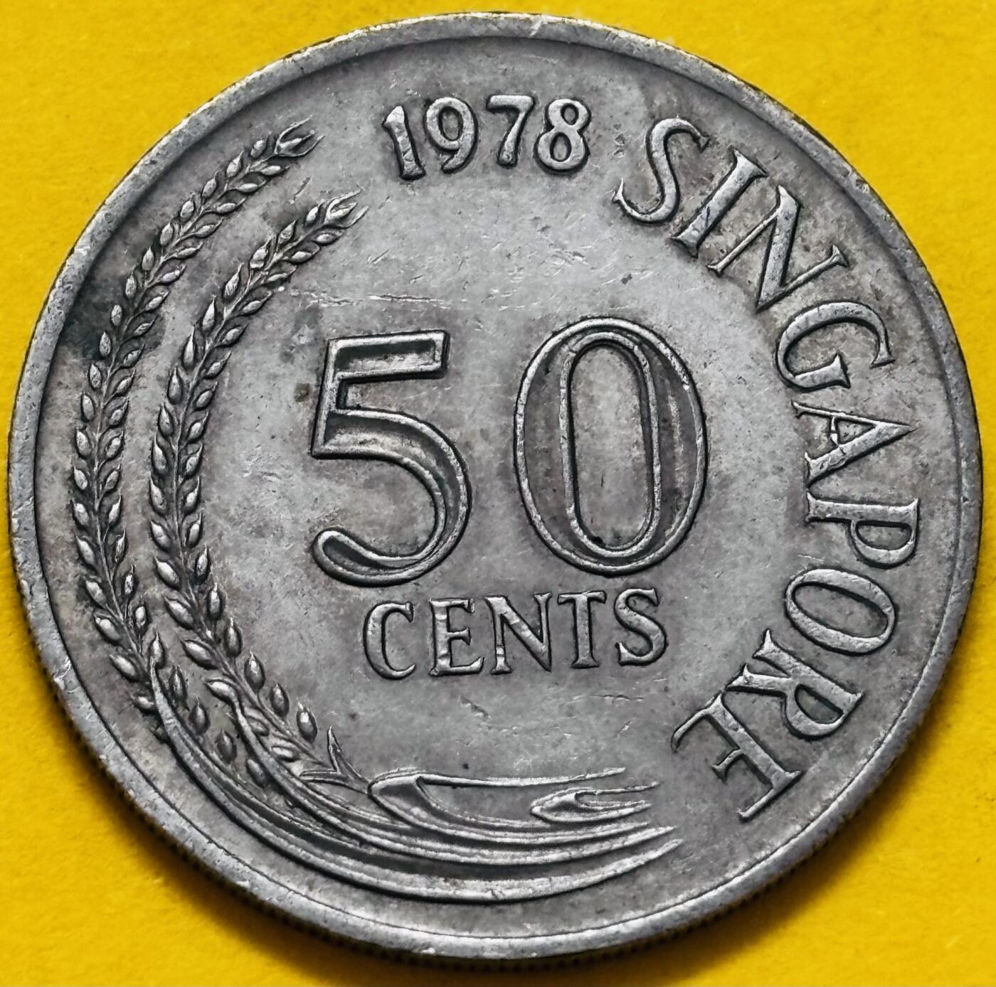 文馨钱币收藏第 295 场，（元宵场）各种银币散币纪念章，长期接代拍业务  1978 年新加坡狮子鱼 50 分