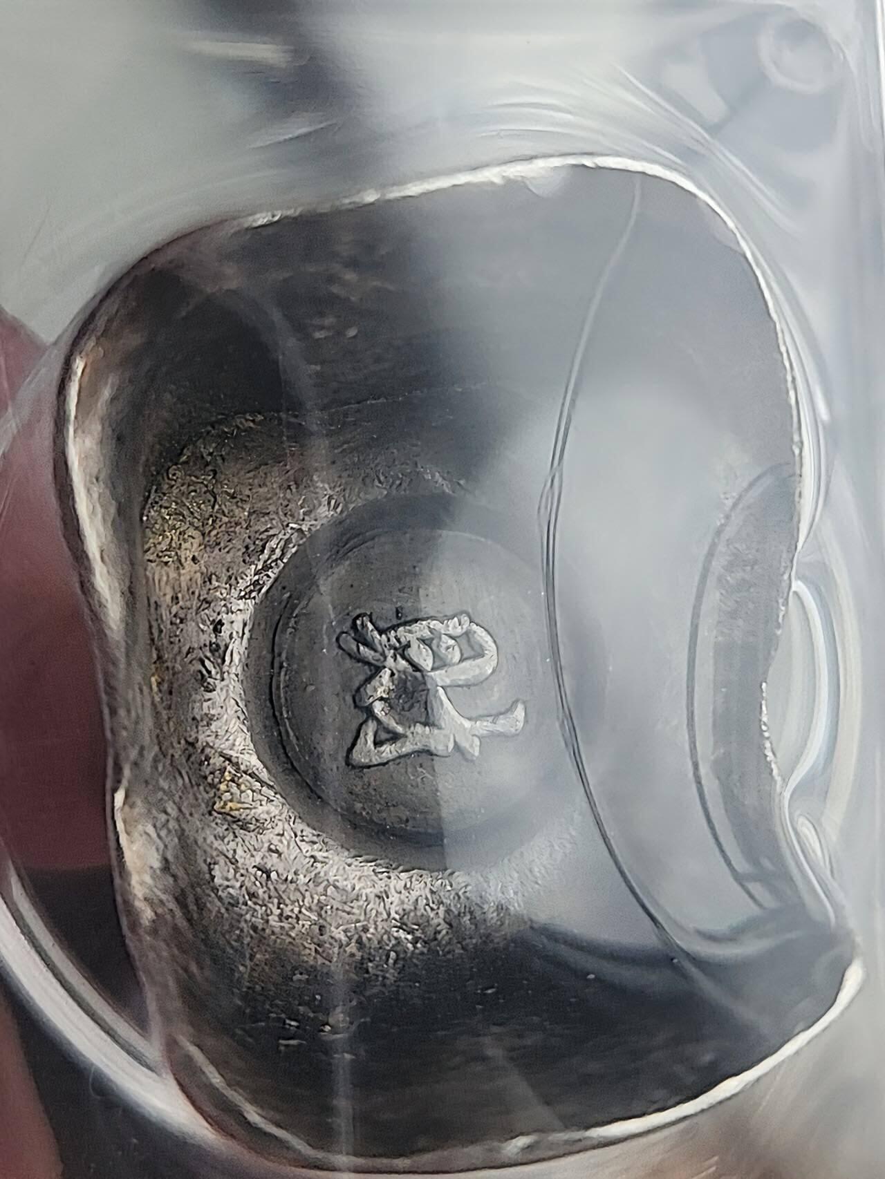 民国"财"字吉语银锭，重31.8克，AU55。