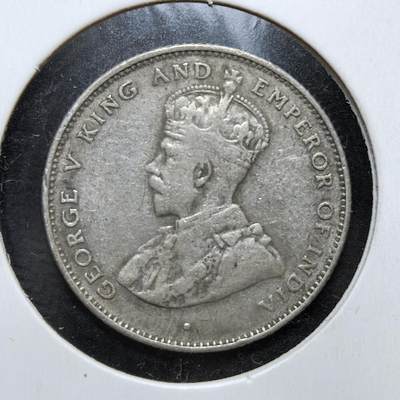 外国优质老铜币银币，正月十二晚九点倒数截拍，满百包邮可寄存，持续收拍 - 英属锡兰1924年50分银币，正面为英王乔治五世像，背面是锡兰国树铁木树与双语面值。发行于一战后经济恢复期，是英国殖民统治的货币遗存，见证了锡兰的殖民贸易与多元文化融合。