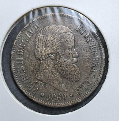 外国优质老铜币银币，正月十二晚九点倒数截拍，满百包邮可寄存，持续收拍 - 巴西帝国1869年20瑞斯，正面为佩德罗二世皇帝像，背面是帝国皇冠盾徽。属 1868 年新启的铜币系列，彼时巴西刚结束三国同盟战争，此币见证了帝国晚期的货币流通与战后复苏。