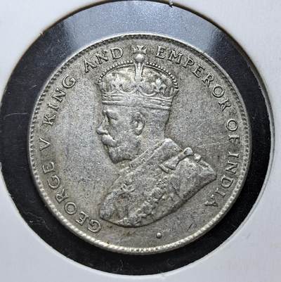 外国优质老铜币银币，正月十二晚九点倒数截拍，满百包邮可寄存，持续收拍 - 英属锡兰1921年50分银币，正面为英王乔治五世像，背面是锡兰国树铁木树与双语面值。发行于一战后经济恢复期，是英国殖民统治的货币遗存，见证了锡兰的殖民贸易与多元文化融合。