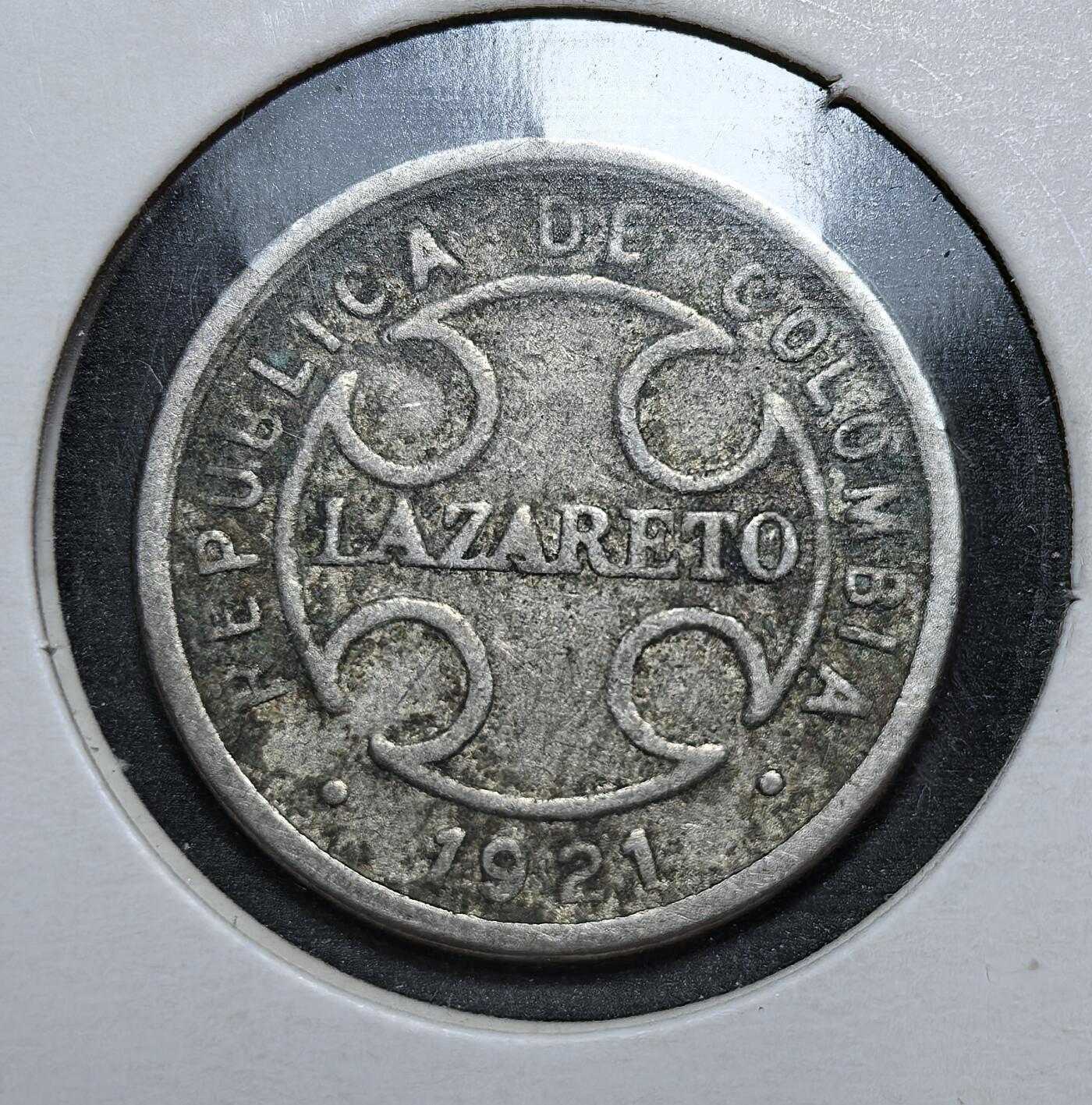 外国优质老铜币银币，正月十二晚九点倒数截拍，满百包邮可寄存，持续收拍 哥伦比亚1921 年 2 分铜镍币，正面为 “LAZARETO”（隔离检疫站）字样与国名，背面标注面值与月桂枝。发行于哥伦比亚公共卫生体系初建期，是其应对传染病、强化国家治理能力的早期货币见证。