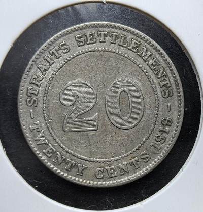 外国优质老铜币银币，正月十二晚九点倒数截拍，满百包邮可寄存，持续收拍 - 英属海峡殖民地1919年20分银币，正面为英王乔治五世像，背面标注面值。它发行于一战后殖民贸易恢复期，流通于新加坡、马六甲等港口，是英国殖民统治与东南亚贸易史的实物见证。