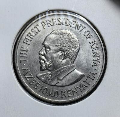 外国优质老铜币银币，正月十二晚九点倒数截拍，满百包邮可寄存，持续收拍 - 肯尼亚1973 年1 先令币，正面为开国总统乔莫・肯雅塔头像，背面是肯尼亚国徽与 “Harambee（齐心协力）” 格言。此币属于 1969 版系列，见证了肯尼亚独立后自主货币体系的巩固与国家建设历程。