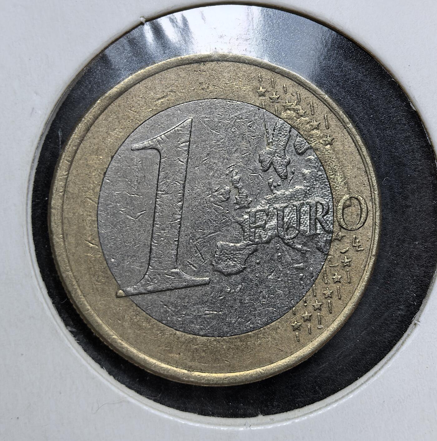 外国优质老铜币银币，正月十二晚九点倒数截拍，满百包邮可寄存，持续收拍 西班牙2007年1 欧元双金属币，正面为胡安・卡洛斯一世国王头像，背面是统一的欧洲地图。它是西班牙融入欧元区、延续君主立宪制与欧洲一体化进程的重要实物见证。