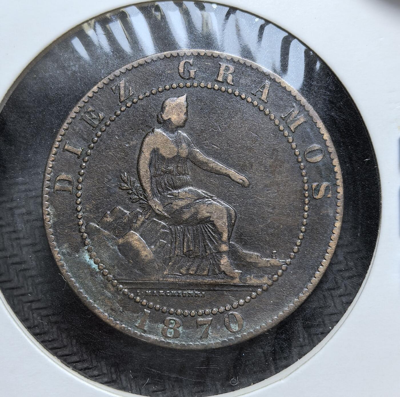 外国优质老铜币银币，正月十二晚九点倒数截拍，满百包邮可寄存，持续收拍 西班牙第一共和国1870 年10 分铜币直径30mm，正面为象征西班牙的坐像，背面是持盾雄狮与币重铭文，见证了西班牙从君主制向共和制过渡的动荡政局