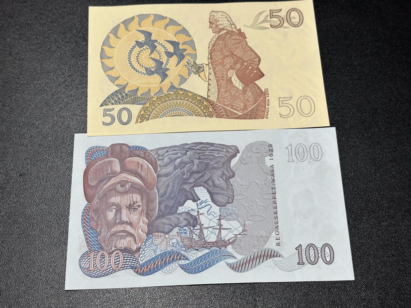 《外钞收藏家》第六百一十三期（ 精品场）（长期征集拍品、欢迎藏友们联系合作） 瑞典1989年50克朗（老国王古斯塔夫三世+卡尔林奈）+100克朗（老国王古斯塔夫二世+瓦萨沉船事件；UNC品较少）	UNC 100疑似极轻微荧光反应