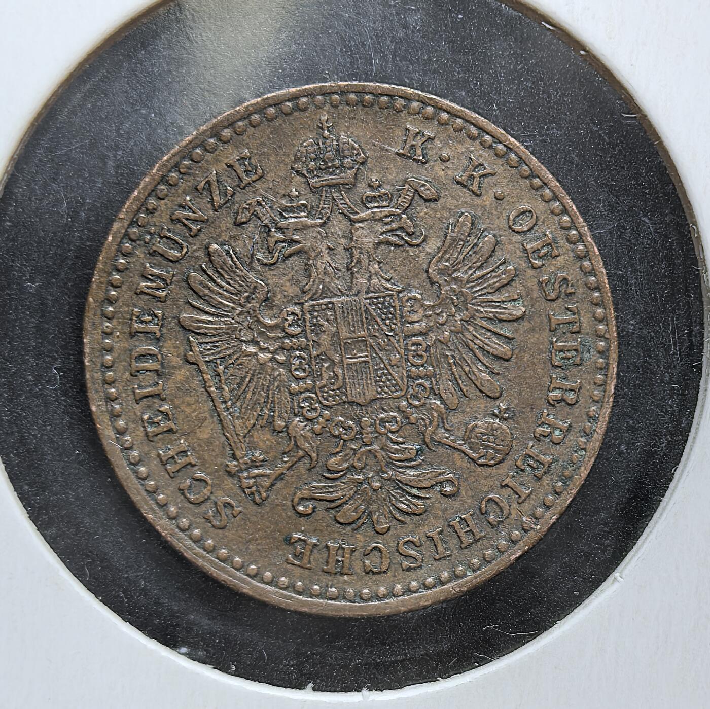 外国优质老铜币银币，正月十二晚九点倒数截拍，满百包邮可寄存，持续收拍 奥地利帝国1859年1克鲁泽铜币，正面为面值与橡叶花环，背面是象征帝国权威的双头鹰国徽。此币发行于奥地利帝国统治中欧的鼎盛时期，见证了其在 19 世纪中叶的货币流通与帝国统治。