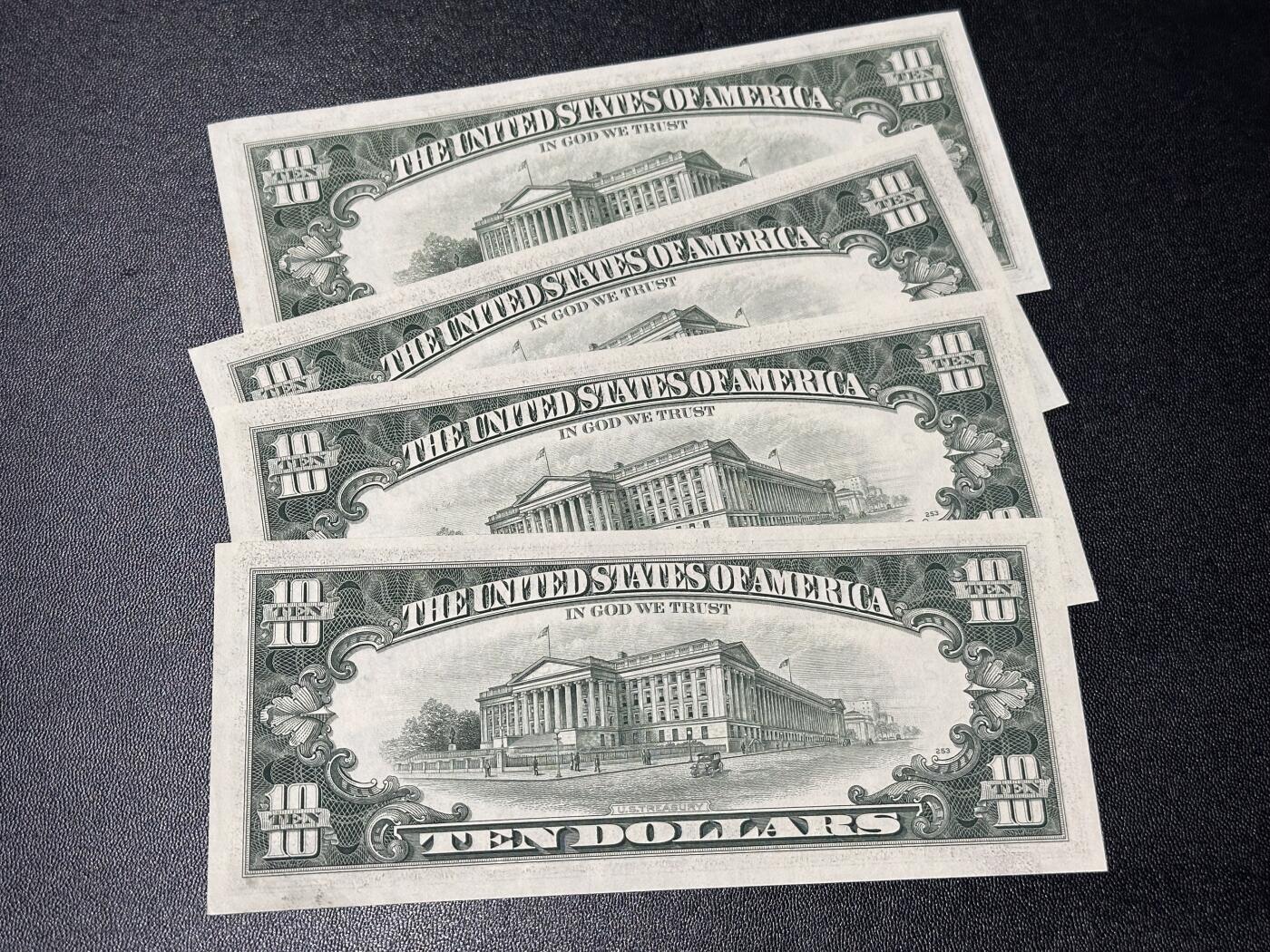 《外钞收藏家》第六百一十三期（ 精品场）（长期征集拍品、欢迎藏友们联系合作） 1985年美国小头版10美元 四张一起 1张有黄斑其他接近全新 边角有瑕疵