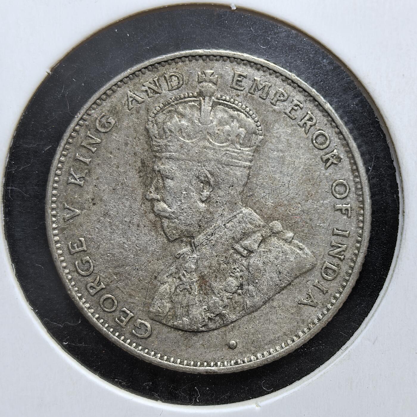 外国优质老铜币银币，正月十二晚九点倒数截拍，满百包邮可寄存，持续收拍 英属锡兰1922年50分银币，正面为英王乔治五世像，背面是锡兰国树铁木树与双语面值。发行于一战后经济恢复期，是英国殖民统治的货币遗存，见证了锡兰的殖民贸易与多元文化融合。