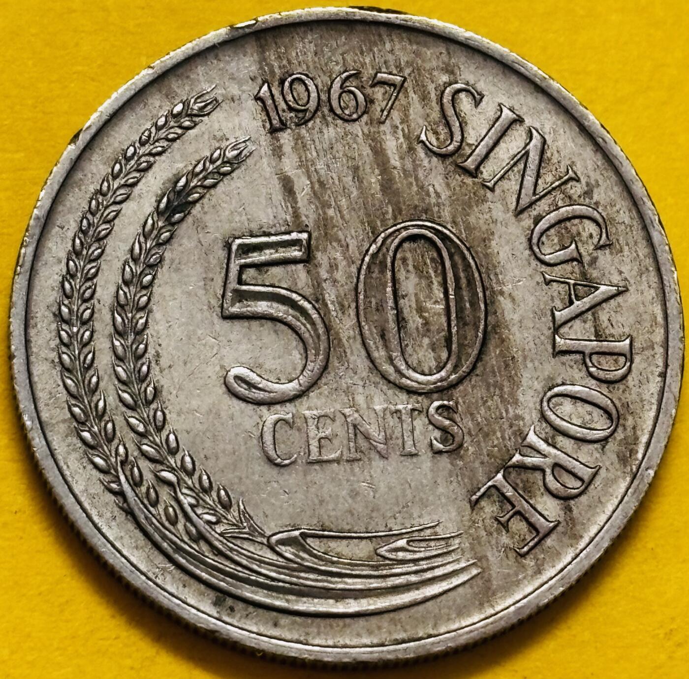 文馨钱币收藏第 295 场，（元宵场）各种银币散币纪念章，长期接代拍业务 1967 年新加坡狮子鱼 50 分，首发版