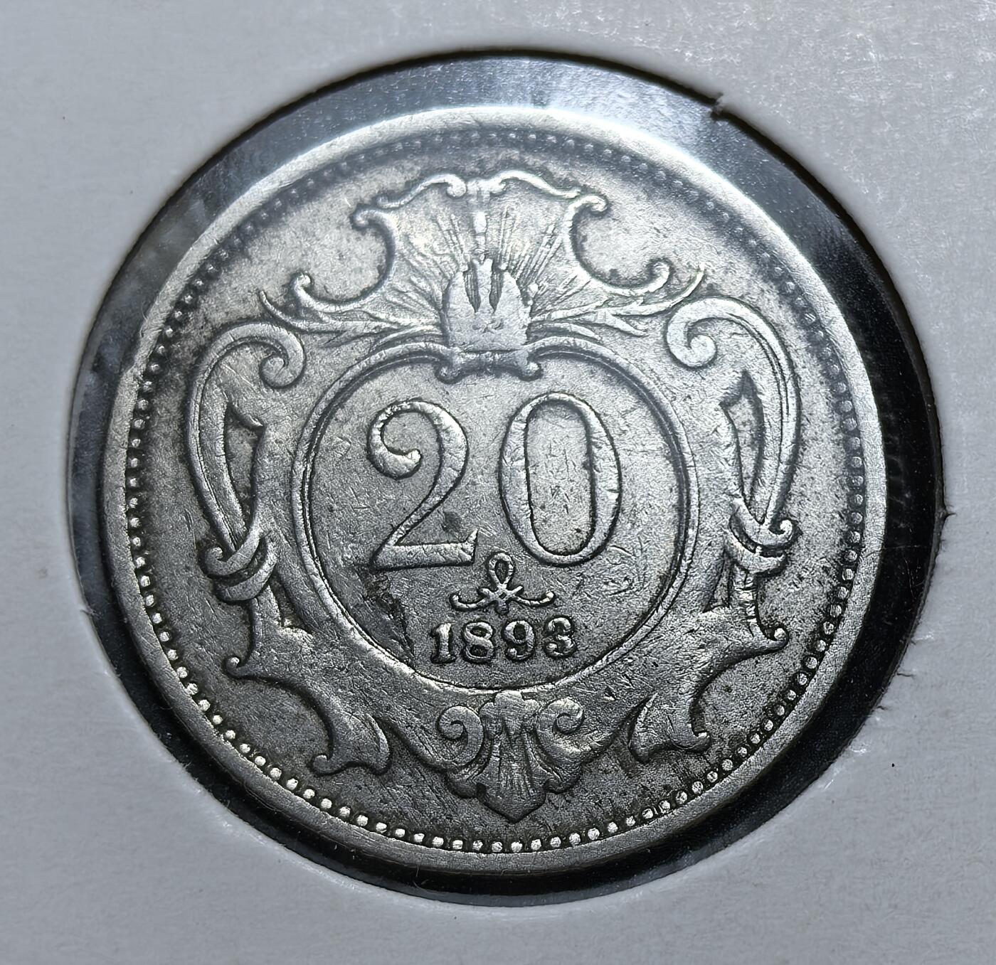 外国优质老铜币银币，正月十二晚九点倒数截拍，满百包邮可寄存，持续收拍 奥匈帝国1893年20 赫勒，属 1892 年货币改革后的首批流通辅币。背面为象征帝国权威的双头鹰，正面标注面值与年份。该币取代旧版古尔登体系，确立金本位制下的十进制货币，见证帝国鼎盛期的金融统一。