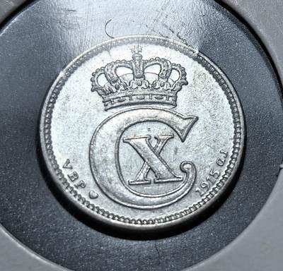 外国优质老铜币银币，正月十二晚九点倒数截拍，满百包邮可寄存，持续收拍 - 丹麦1915年10欧尔银币，正面为克里斯蒂安十世的花押与王冠，背面标注面值。发行于一战期间，丹麦虽保持中立，但经济受战争冲击，此币是其战时货币体系与中立国身份的重要见证。