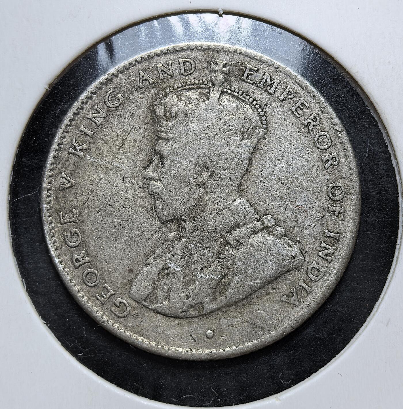 外国优质老铜币银币，正月十二晚九点倒数截拍，满百包邮可寄存，持续收拍 英属锡兰1920年50分银币，正面为英王乔治五世像，背面是锡兰国树铁木树与双语面值。发行于一战后经济恢复期，是英国殖民统治的货币遗存，见证了锡兰的殖民贸易与多元文化融合。