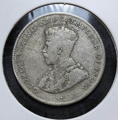 外国优质老铜币银币，正月十二晚九点倒数截拍，满百包邮可寄存，持续收拍 - 英属锡兰1920年50分银币，正面为英王乔治五世像，背面是锡兰国树铁木树与双语面值。发行于一战后经济恢复期，是英国殖民统治的货币遗存，见证了锡兰的殖民贸易与多元文化融合。