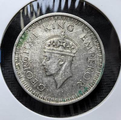 外国优质老铜币银币，正月十二晚九点倒数截拍，满百包邮可寄存，持续收拍 - 英属印度1942 年1 卢比银币，属二战战时版，。正面为乔治六世（印度末代皇帝），背面饰有莲花与英伦三岛花卉，是殖民末期的历史实物，亦见证了战时印缅战场风云。