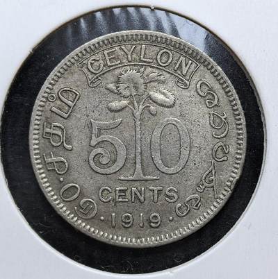外国优质老铜币银币，正月十二晚九点倒数截拍，满百包邮可寄存，持续收拍 - 英属锡兰1919年50分银币，正面为英王乔治五世像，背面是锡兰国树铁木树与双语面值。发行于一战后经济恢复期，是英国殖民统治的货币遗存，见证了锡兰的殖民贸易与多元文化融合。