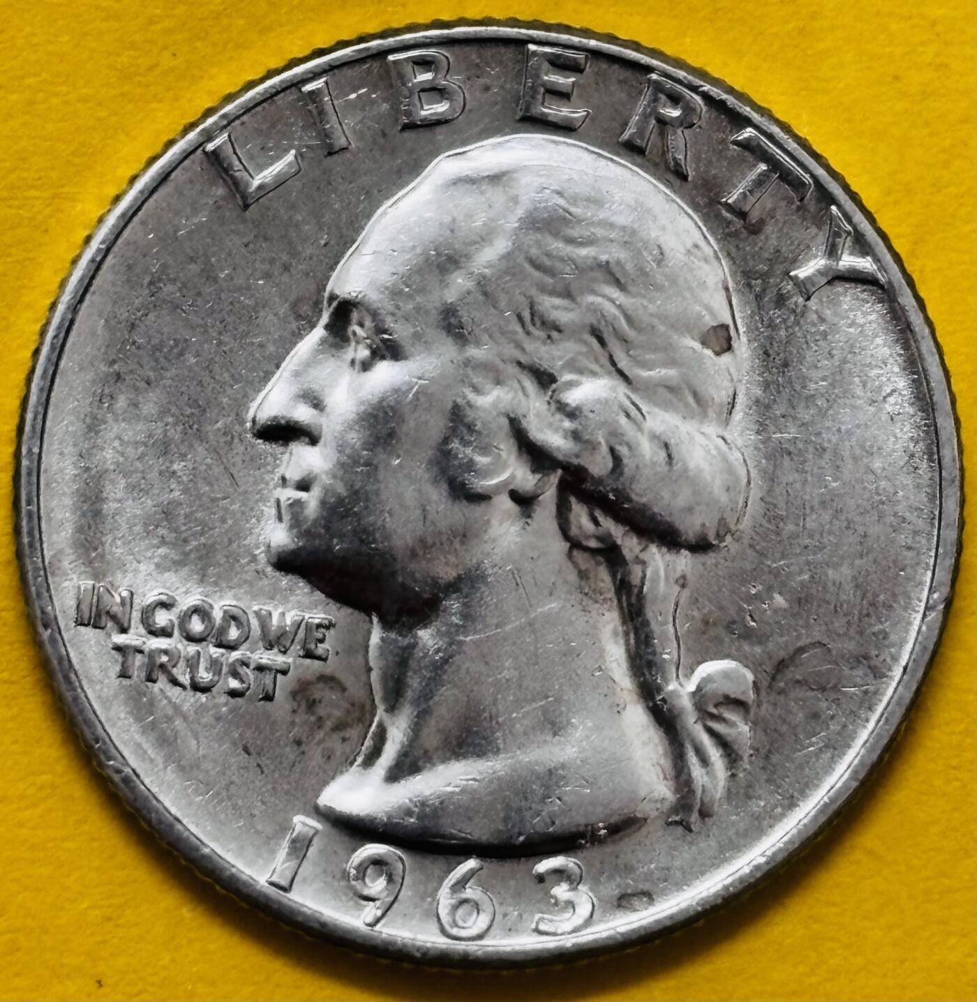 文馨钱币收藏第 295 场，（元宵场）各种银币散币纪念章，长期接代拍业务 全新卷拆品相 1963 年美国华盛顿白头鹰 25 美分银币， 6.25 克 900 银D 厂