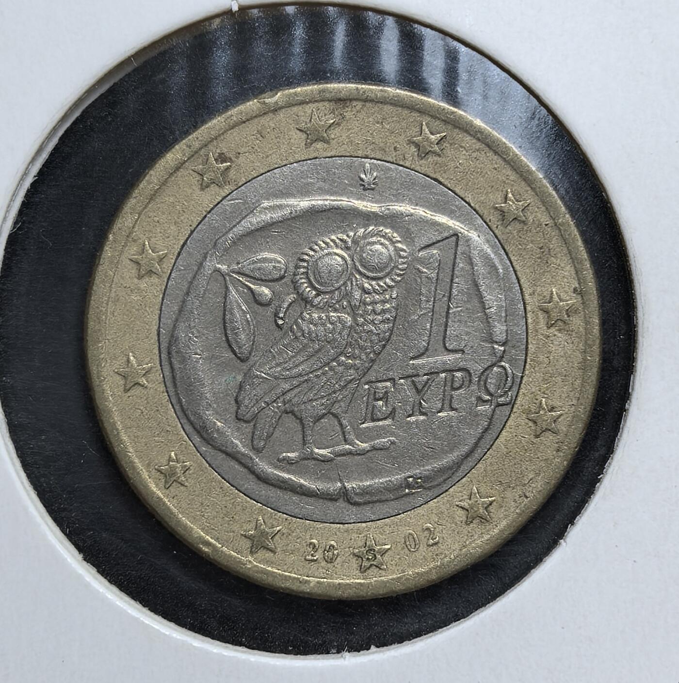 外国优质老铜币银币，正月十二晚九点倒数截拍，满百包邮可寄存，持续收拍 希腊猫头鹰银币1 欧元双金属币，为欧元区首批流通币。国家面复刻古希腊雅典 “猫头鹰银币” 经典图案，象征智慧女神雅典娜；共同面为欧洲地图。它实现了 2500 年古币文明与现代欧洲货币一体化的历史衔接。