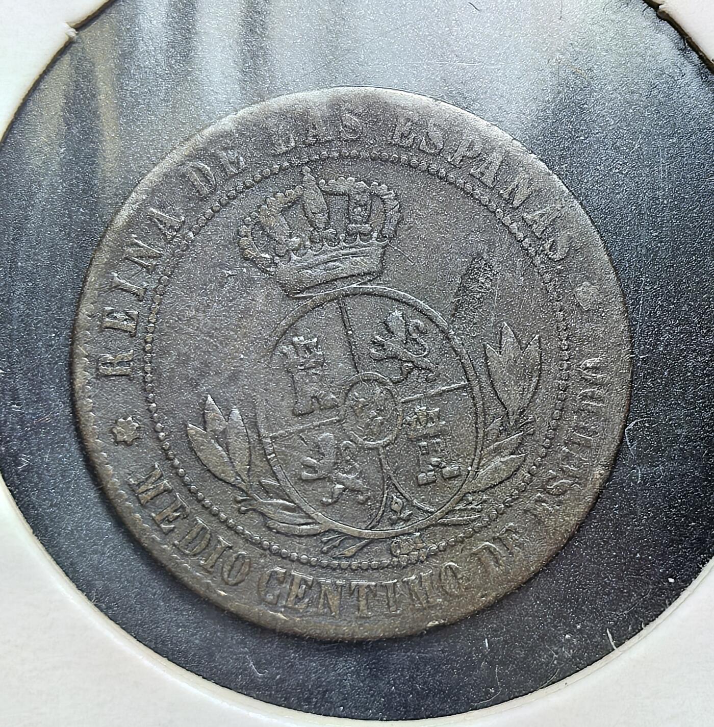 外国优质老铜币银币，正月十二晚九点倒数截拍，满百包邮可寄存，持续收拍 西班牙1867 年0.5 分铜币，正面为伊莎贝拉二世女王头像，背面是西班牙国徽。此币发行于女王统治末期，见证了西班牙在殖民衰退与国内动荡中，维持货币体系运行的历史阶段。