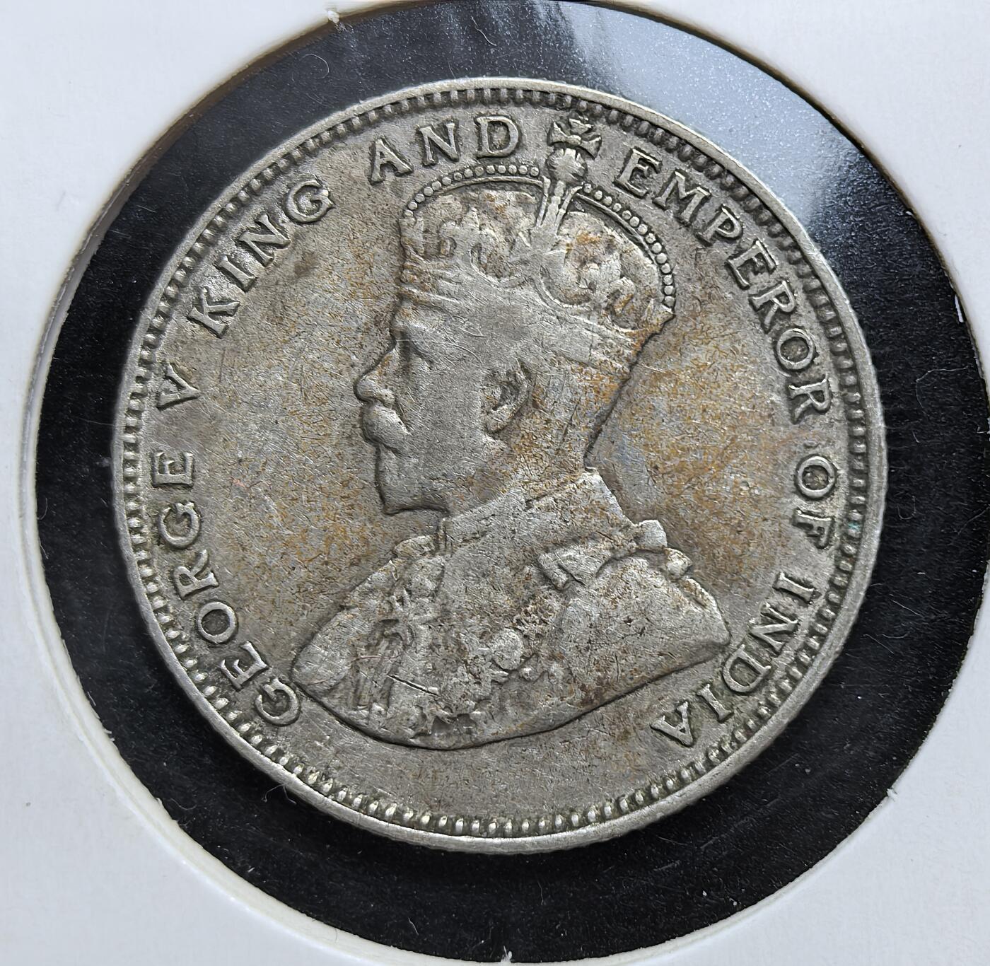 外国优质老铜币银币，正月十二晚九点倒数截拍，满百包邮可寄存，持续收拍 英属海峡殖民地1927年20分银币，正面为英王乔治五世像，背面标注面值。它发行于殖民贸易繁荣期，流通于新加坡、马六甲等港口，是英国殖民统治与东南亚贸易史的实物见证。