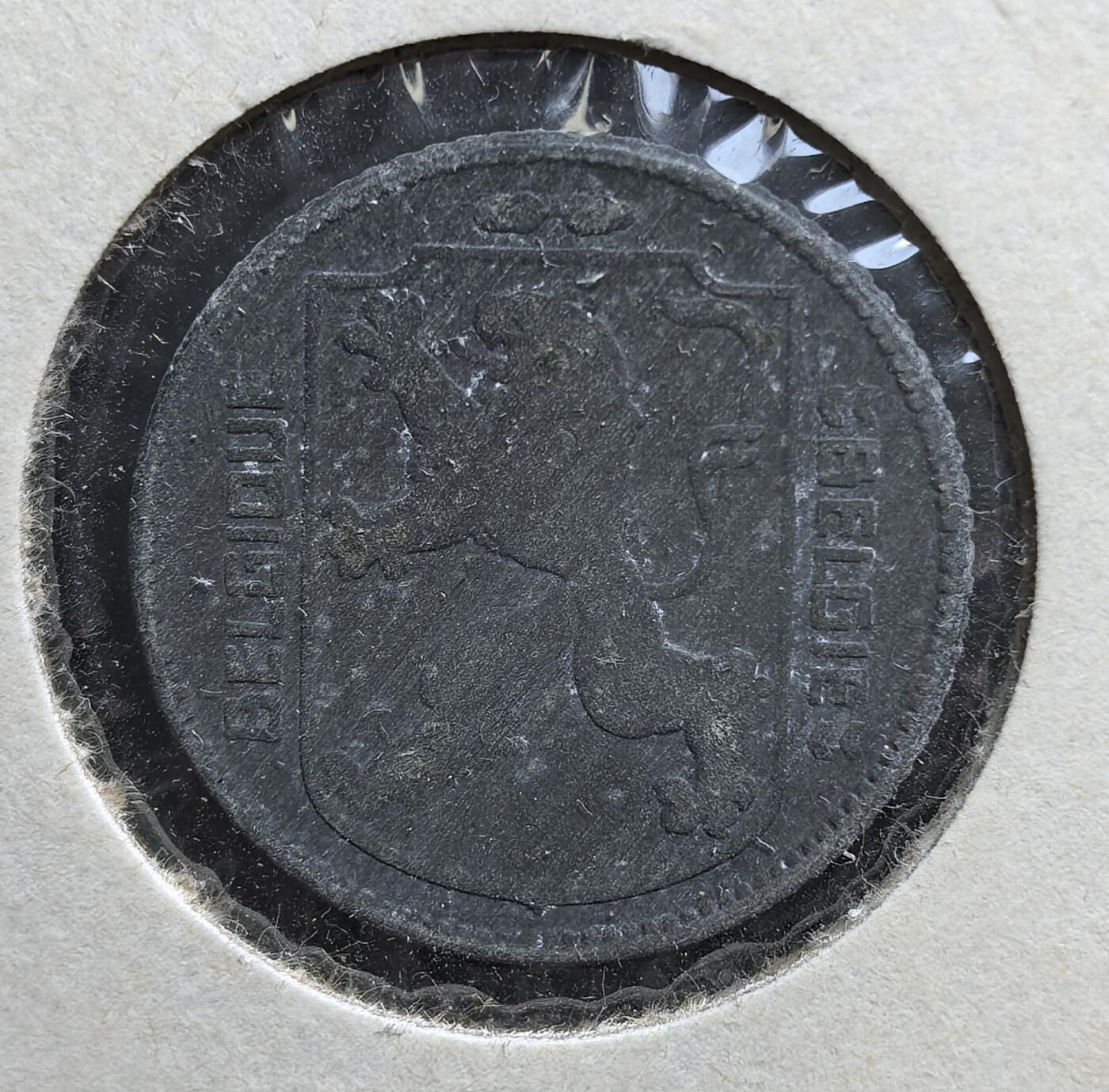 外国优质老铜币银币，正月十二晚九点倒数截拍，满百包邮可寄存，持续收拍 二战德占比利时1942年1法郎，正面为比利时雄狮纹章，背面是王冠与盾徽。因德军掠夺金属，比利时改用锌材铸币，它是纳粹占领下比利时经济受迫、民众艰难求生的珍贵历史实物见证。