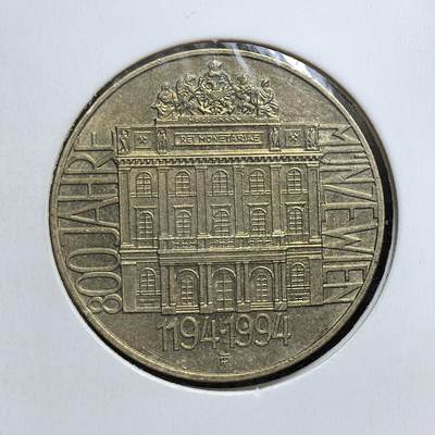 外国优质老铜币银币，正月十二晚九点倒数截拍，满百包邮可寄存，持续收拍 - 奥地利1994 年20 先令纪念币，正面为奥地利国徽及面值，背面是维也纳造币厂总部建筑与年份。该币纪念维也纳造币厂成立 800 周年，见证其千年传承与奥地利货币文化历史。