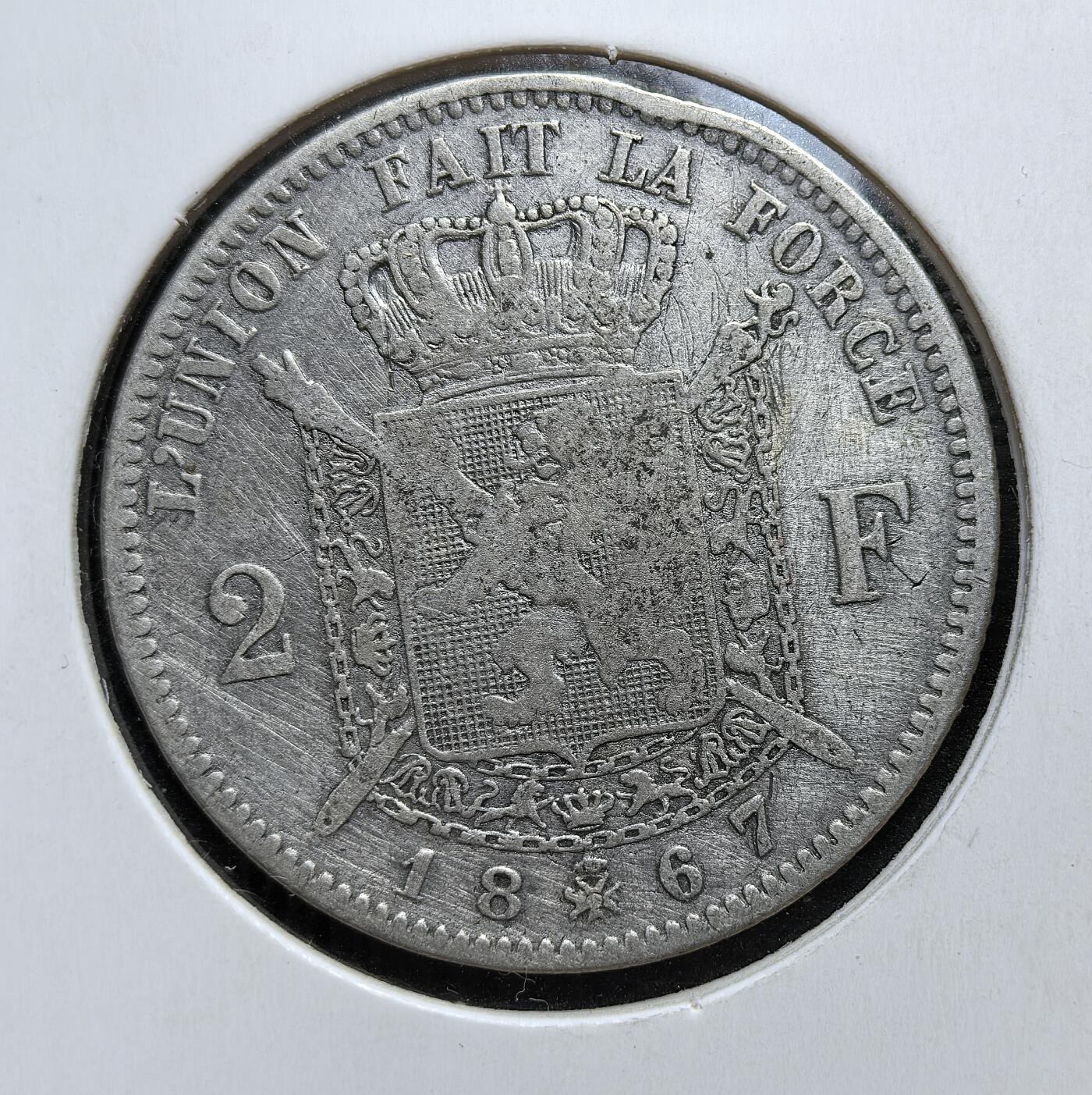 外国优质老铜币银币，正月十二晚九点倒数截拍，满百包邮可寄存，持续收拍 比利时1867年2法郎银币，正面为利奥波德二世头像，背面是国徽与 “团结就是力量” 箴言。它发行于比利时工业化与殖民扩张初期，是其近代货币体系与国家身份认同的重要载体。