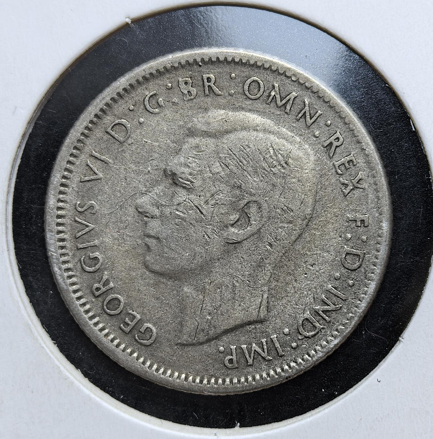 外国优质老铜币银币，正月十二晚九点倒数截拍，满百包邮可寄存，持续收拍 澳大利亚1946 年1先令银币，正面为英王乔治六世像，背面是象征澳洲支柱产业的美利奴公羊。它发行于二战结束初期，是澳大利亚战后经济重建阶段的核心流通银币，也是其畜牧业立国的历史见证。