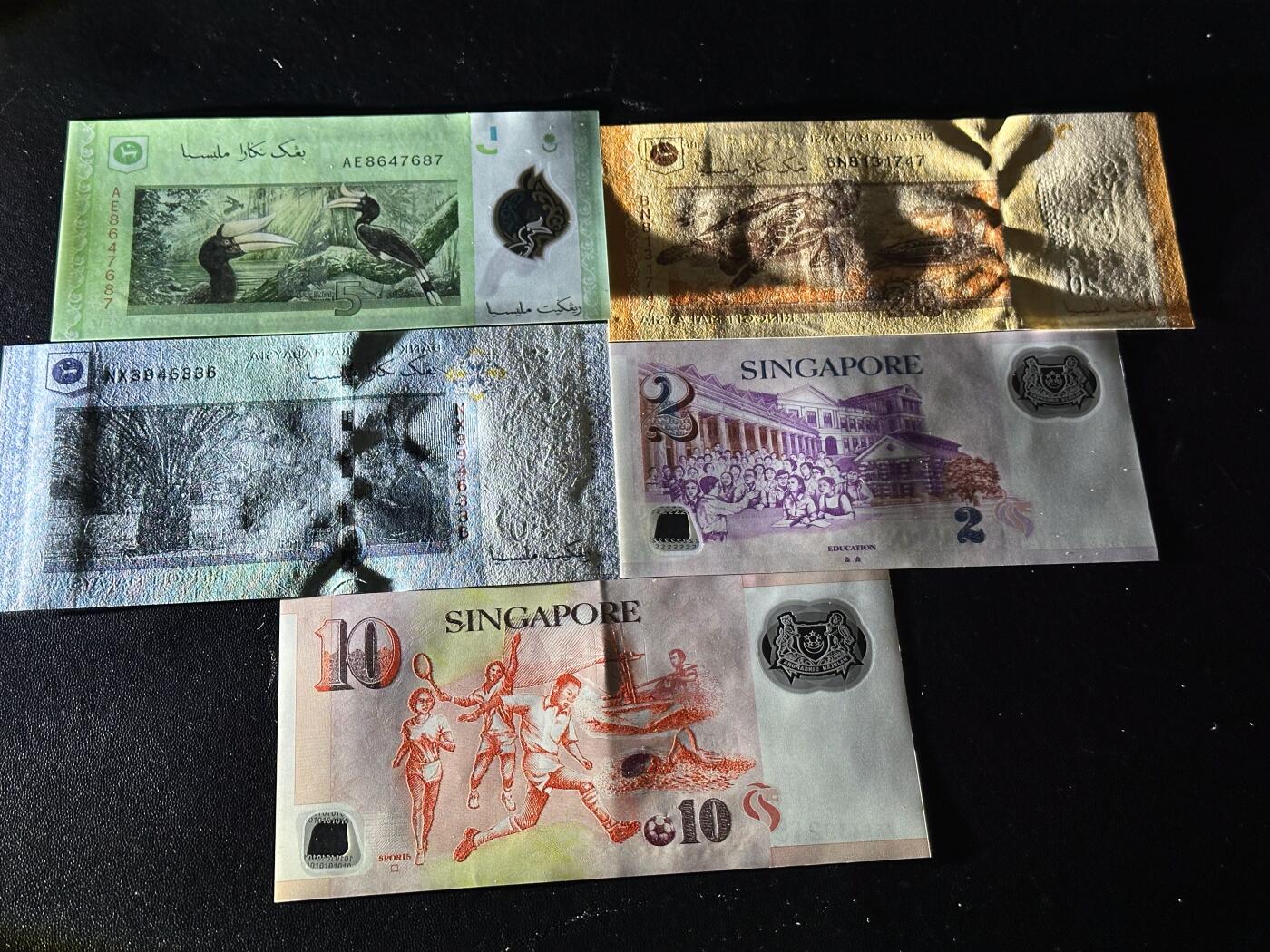 《外钞收藏家》第六百一十三期（ 精品场）（长期征集拍品、欢迎藏友们联系合作） 马来西亚5、20、50林吉特3张全新+新加坡2、10元2张10有牙印