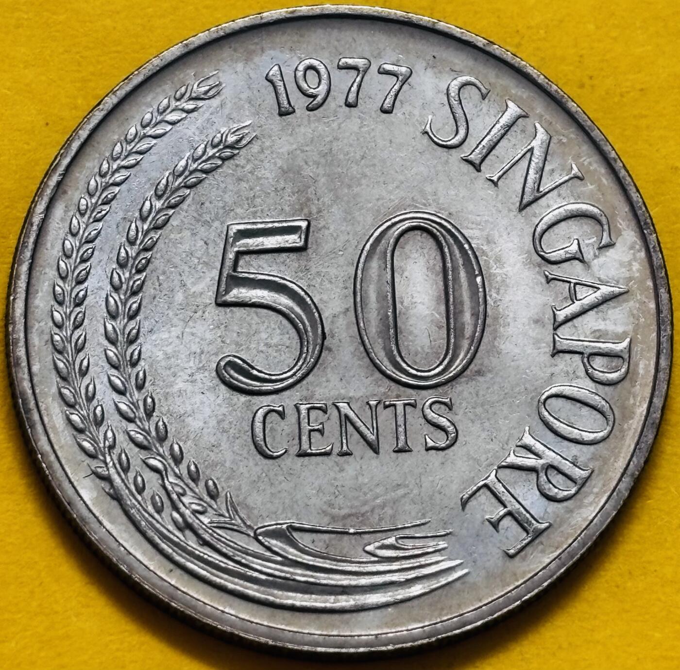 文馨钱币收藏第 295 场，（元宵场）各种银币散币纪念章，长期接代拍业务 原光 1977 年新加坡狮子鱼 50 分