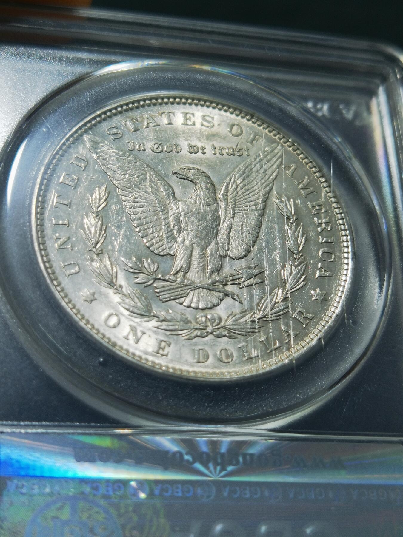 天下钱庄专场欢迎参拍 公博评级MS62 1891美国摩根一美元银币，盒子有牛毛裂