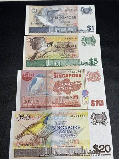 《外钞收藏家》第六百一十三期（ 精品场）（长期征集拍品、欢迎藏友们联系合作） - 新加坡鸟版1/5/10/20元4张小套（UNC品相的不多见了） 	除了10元 其他UNC 有潮斑