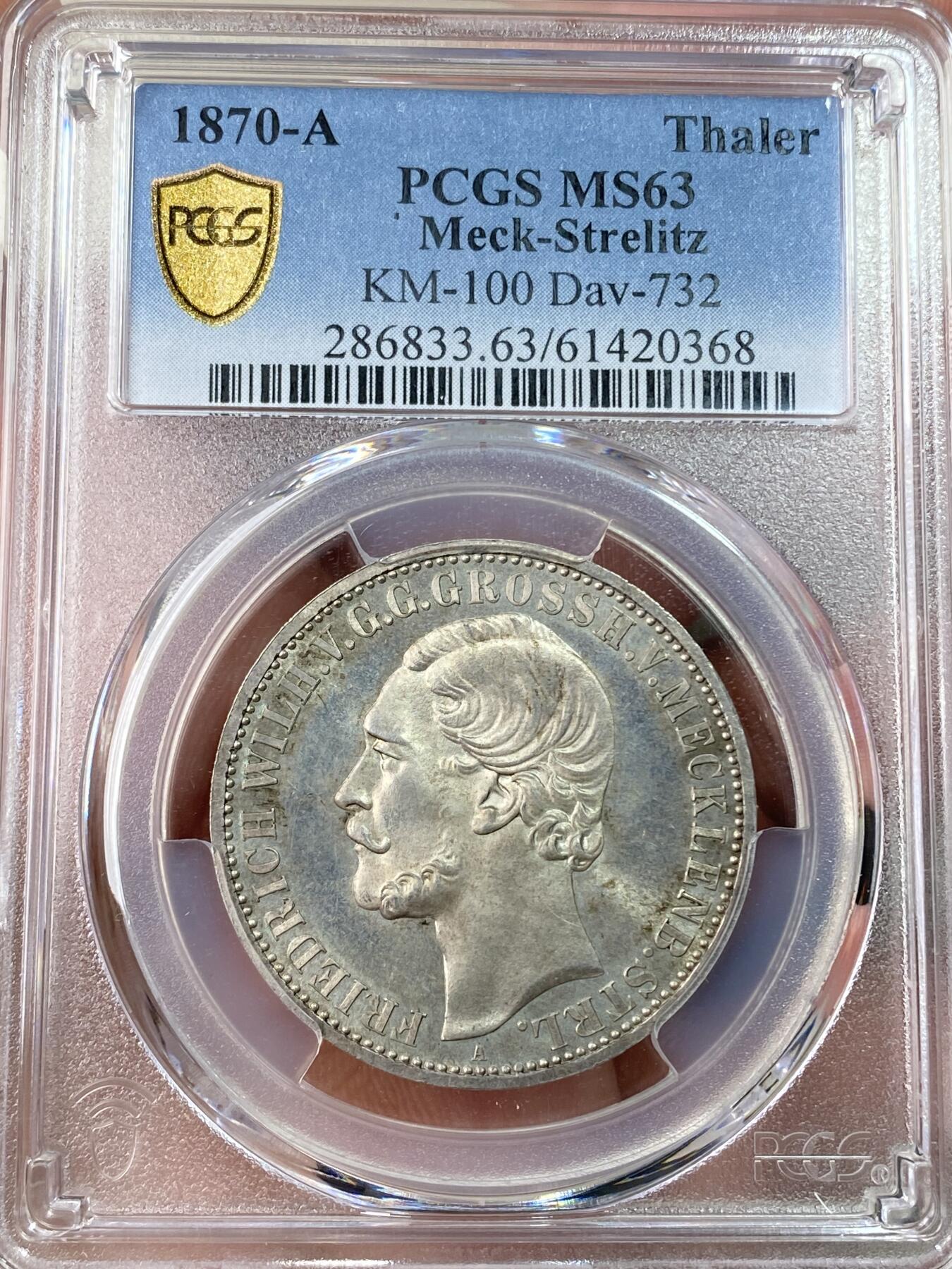 万国钱币拍卖第062期 PCGS MS63 1870年德国梅克伦堡-施特雷利茨流通纹章1泰勒 发行量仅5W枚的高难小邦品种 德系盾徽与嘉德勋章的结合 嘉德勋章环绕着“Honi soit qui mal y pense”“心怀邪念者蒙羞” 欧陆淡彩环绕类镜面喷砂质感 PCGS亚军分更高仅仅2枚 顶级收藏品质
