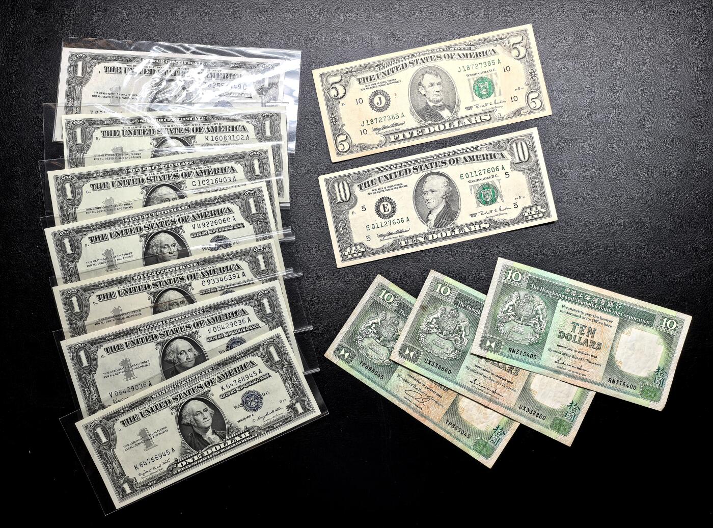 此心安处是吾乡·凡希社世界钱币微拍第三百二十期 美元&港币纸钞一组，包括全新1美元7张。