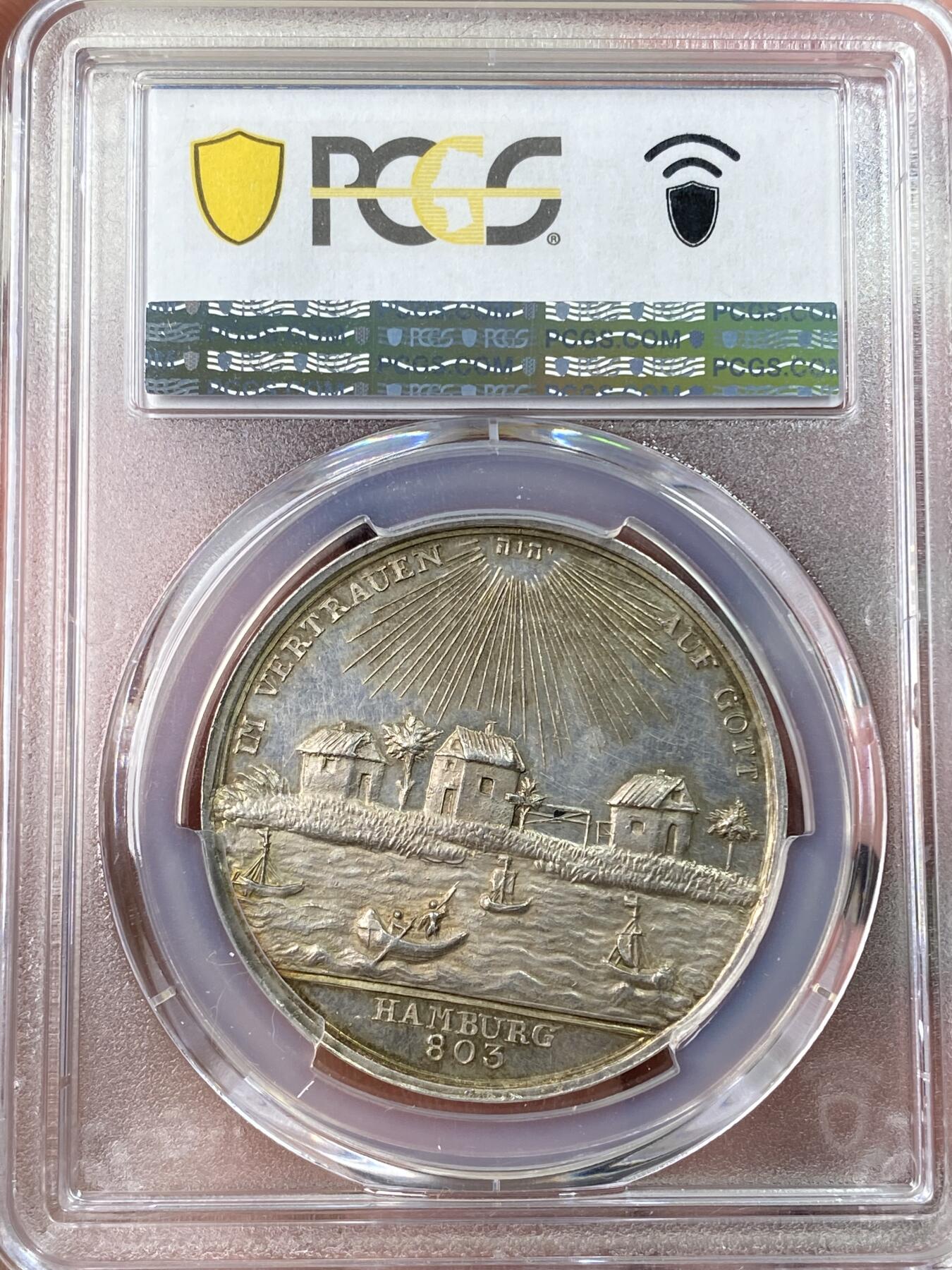 万国钱币拍卖第062期 PCGS MS62 1803年德国汉堡建城千年纪念银章 三款汉堡千年中城市景观最为立体精美的一款 类镜面底板配合均匀香槟金彩浮雕 绝对不可多得的收藏品质 PCGS冠军分