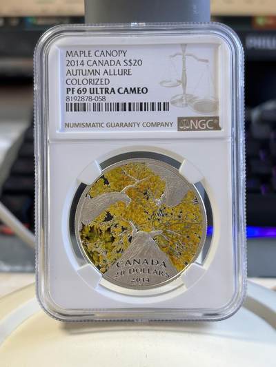 第191期拍卖 - 加拿大2014年最美枫叶秋天纪念1盎司彩色银币获奖币ngc pf69，9999银，发行7500枚