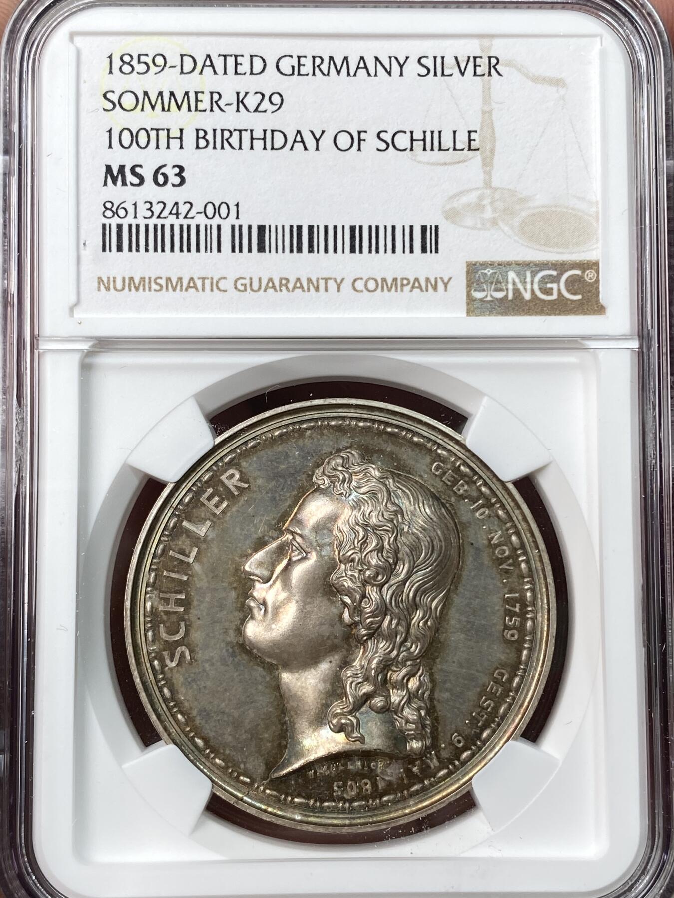 万国钱币拍卖第062期 NGC MS63 1859年德国席勒诞辰百年纪念大银章 NGC唯一评级记录冠军分 罕见珍稀品种 精铸工艺强镜面 高浮雕细节人物栩栩如生 实物通体火烧云金彩非常漂亮