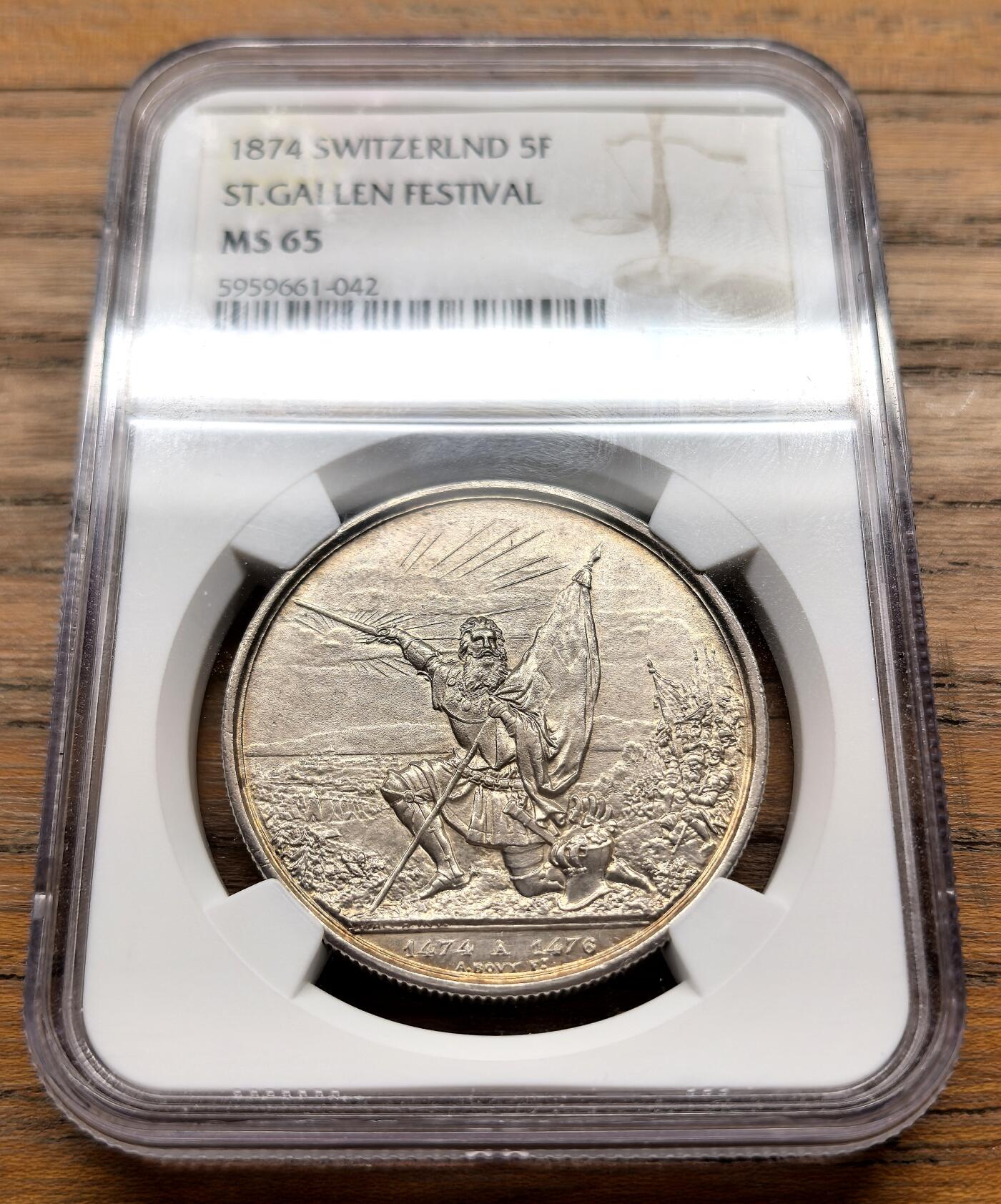 此心安处是吾乡·凡希社世界钱币微拍第三百二十期 1874瑞士圣加仑射击节5法郎大银NGC-MS65，淡彩香槟金，高分难得！