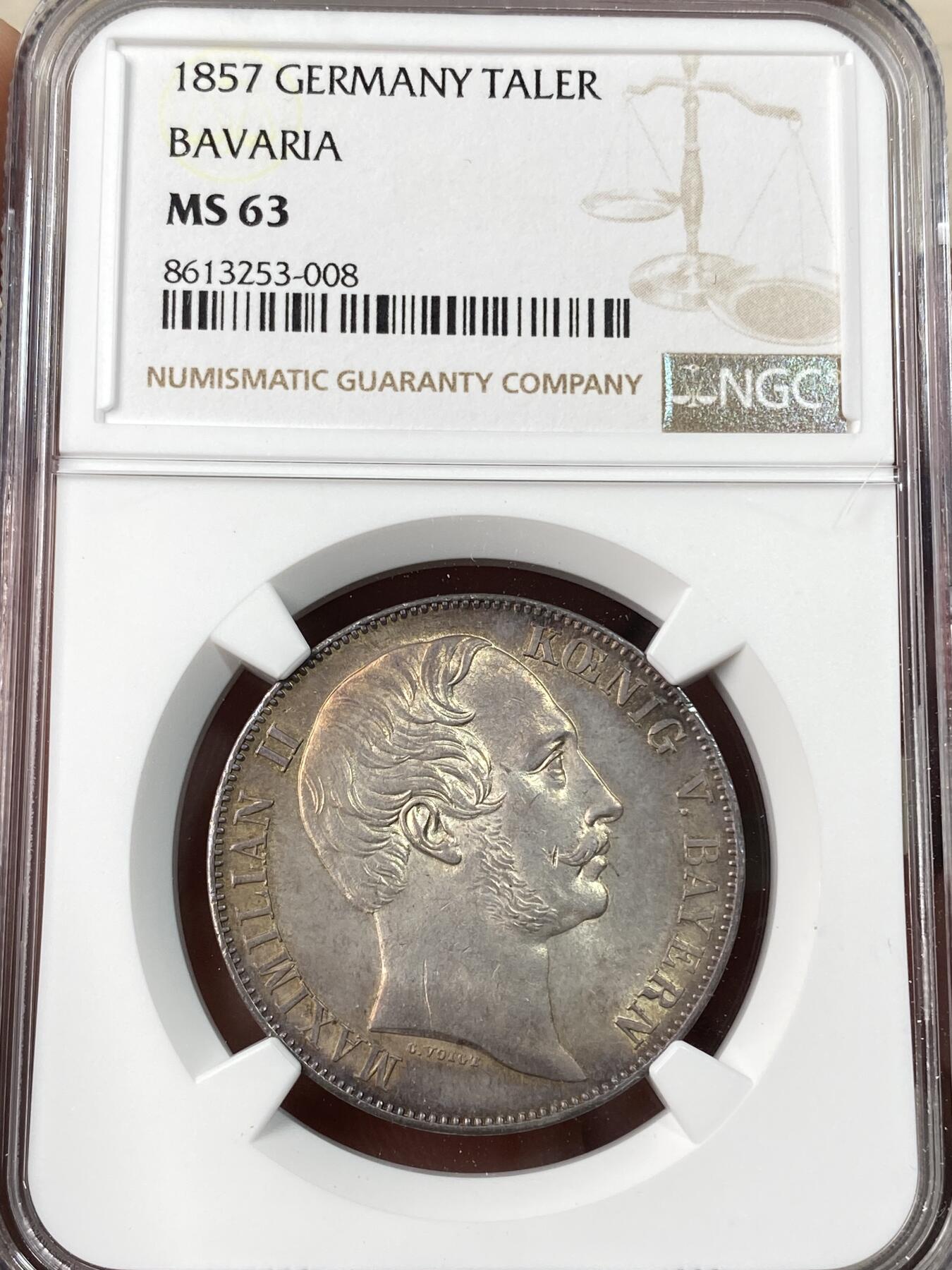 万国钱币拍卖第062期 NGC MS63 1857年德国巴伐利亚马克西米利安二世双狮纹章流通1泰勒 绚丽欧陆油画五彩包浆也掩盖不住的底光迸发  难度不小的流通品种收藏级