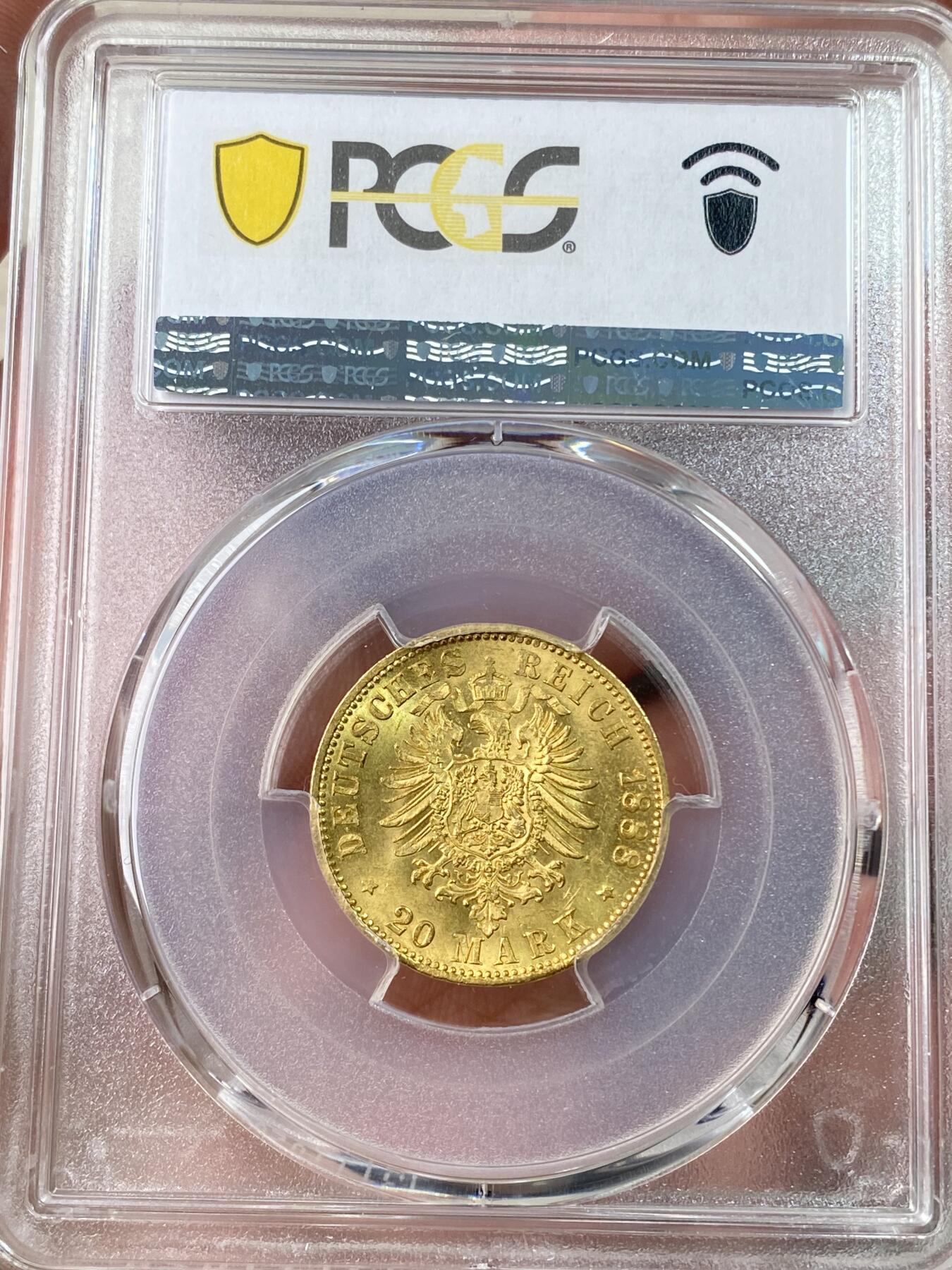 万国钱币拍卖第062期 PCGS MS64 1888年德国普鲁士三皇之年腓特烈三世短翅流通20马克金币 单年发行三皇系列名誉品种 丝绸黄金转光底板邮票质感 高分越来越难的品种 顶级典藏品质 7.96g 900金