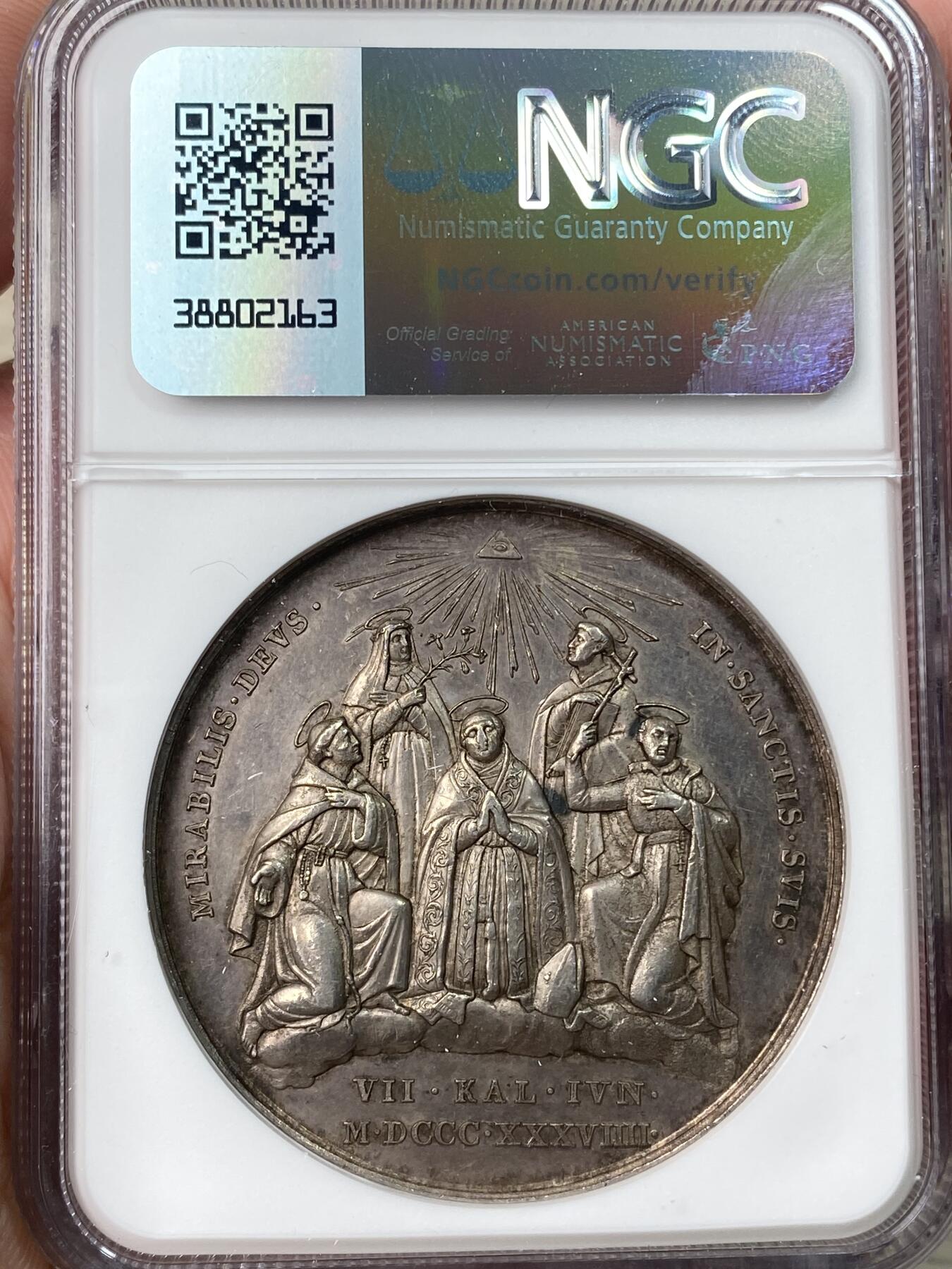 万国钱币拍卖第062期 NGC AU58 1839年梵蒂冈教皇国格里高利十六世纪念年度封圣仪式大银章 早期教皇国高浮雕精品 欧陆原味包浆 本次年度封圣者为有有西班牙的乔瓦尼·德拉·克罗切（1542-1591）以及意大利的阿方索·玛利亚·德·利古奥里（1696-1787）、弗朗切斯科·德·杰罗尼莫（1642-1716）、帕奇菲科·达·圣塞韦里诺（1653-1721）和维罗妮卡·朱利亚尼