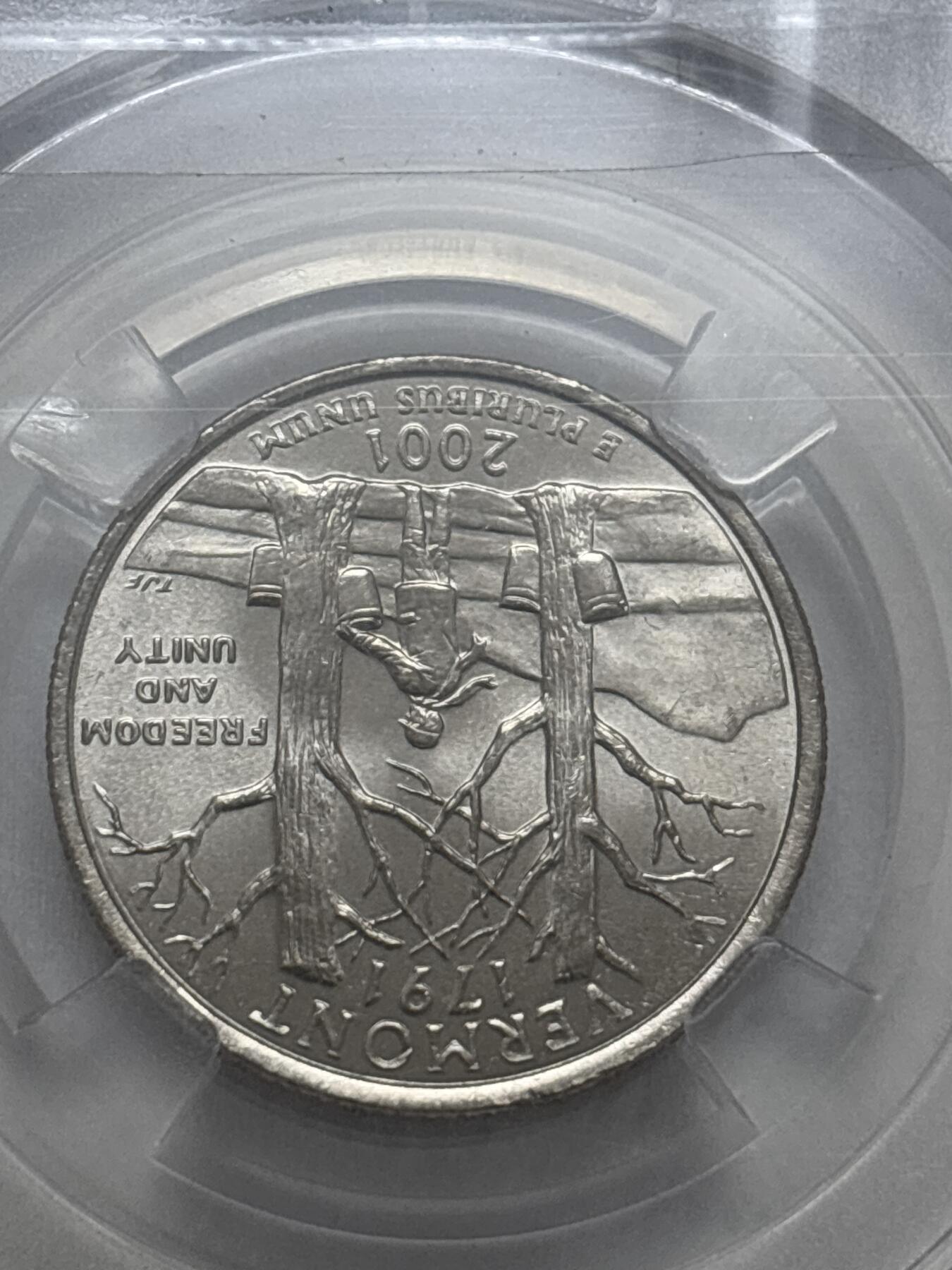 文馨钱币收藏第 295 场，（元宵场）各种银币散币纪念章，长期接代拍业务 2001 年美国州币 25 分 MS69 分