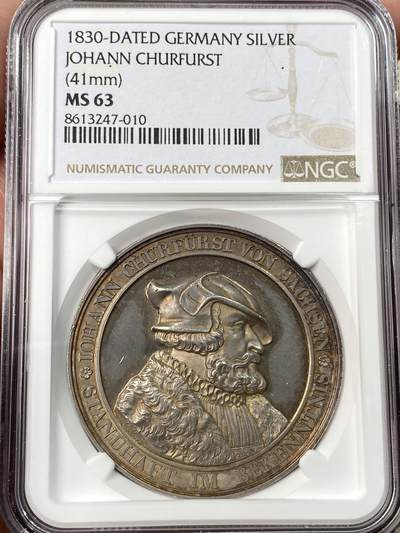 万国钱币拍卖第062期 - NGC MS63 1830年萨克森安东王朝纪念奥格斯堡宗教改革300周年大银章 罕见品种 正面为选帝侯约翰侧像头戴穆茨帽 著名的“自行车坐垫 ”头像 背面宗教女神点亮圣火 此品种唯一入盒最高冠军分 淡金彩均匀覆盖镜面精铸底板 41.44MM 27.03G