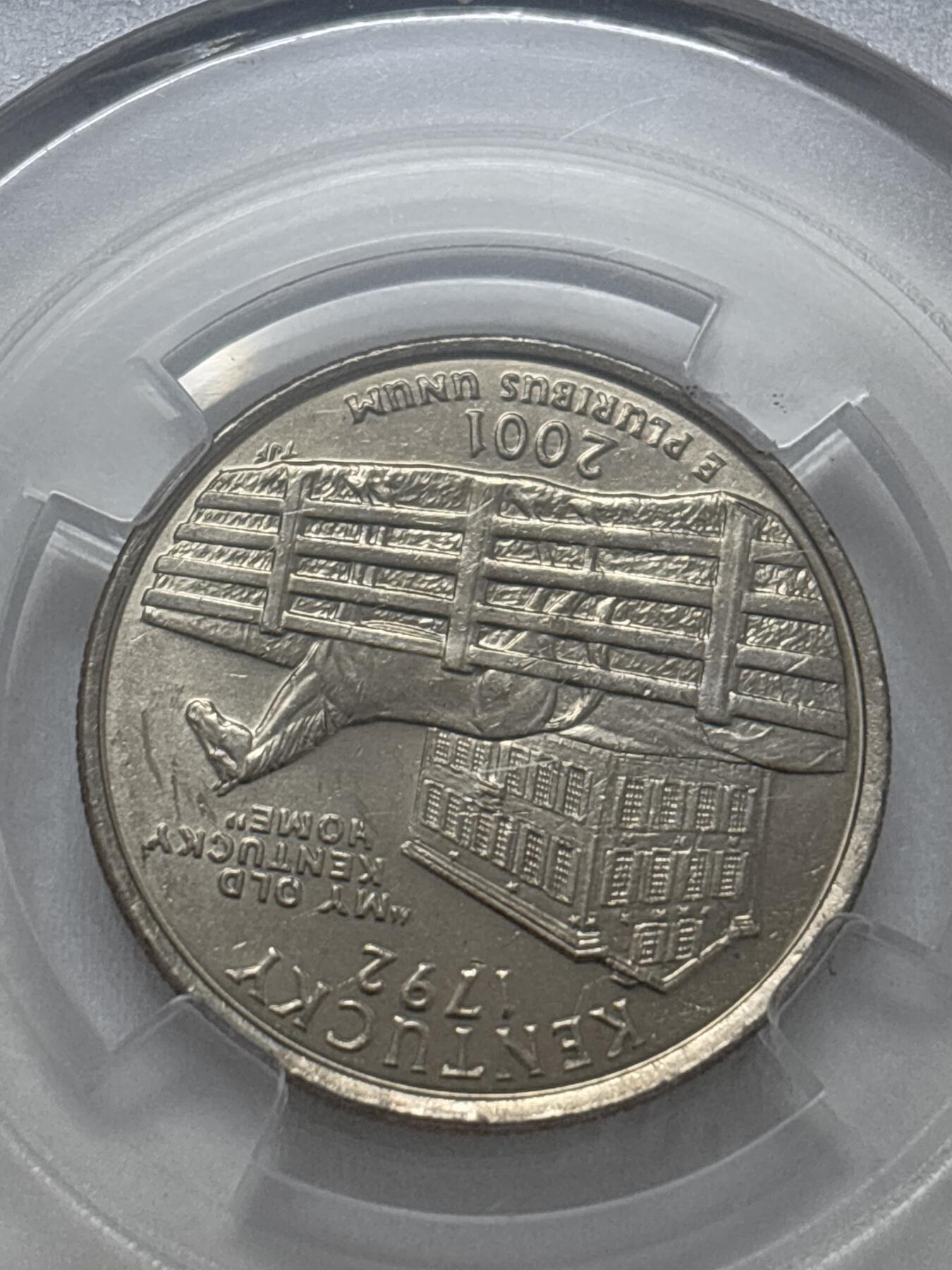 文馨钱币收藏第 295 场，（元宵场）各种银币散币纪念章，长期接代拍业务 2001 年美国州币 25 分 MS69 分