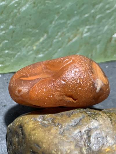 精美荔枝冻柿子红水冲籽川料南红玛瑙原石一颗 精美荔枝冻柿子红水冲籽川料南红玛瑙原石一颗