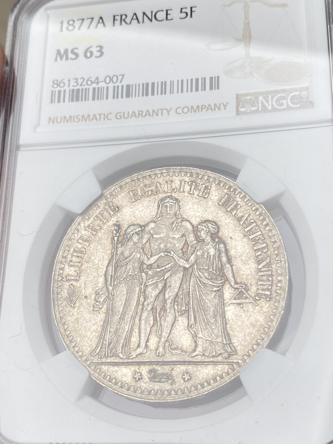 万国钱币拍卖第062期 NGC MS63 1877年法国大力神5法郎 经典品种 海量进入流通 转光淡五彩包浆