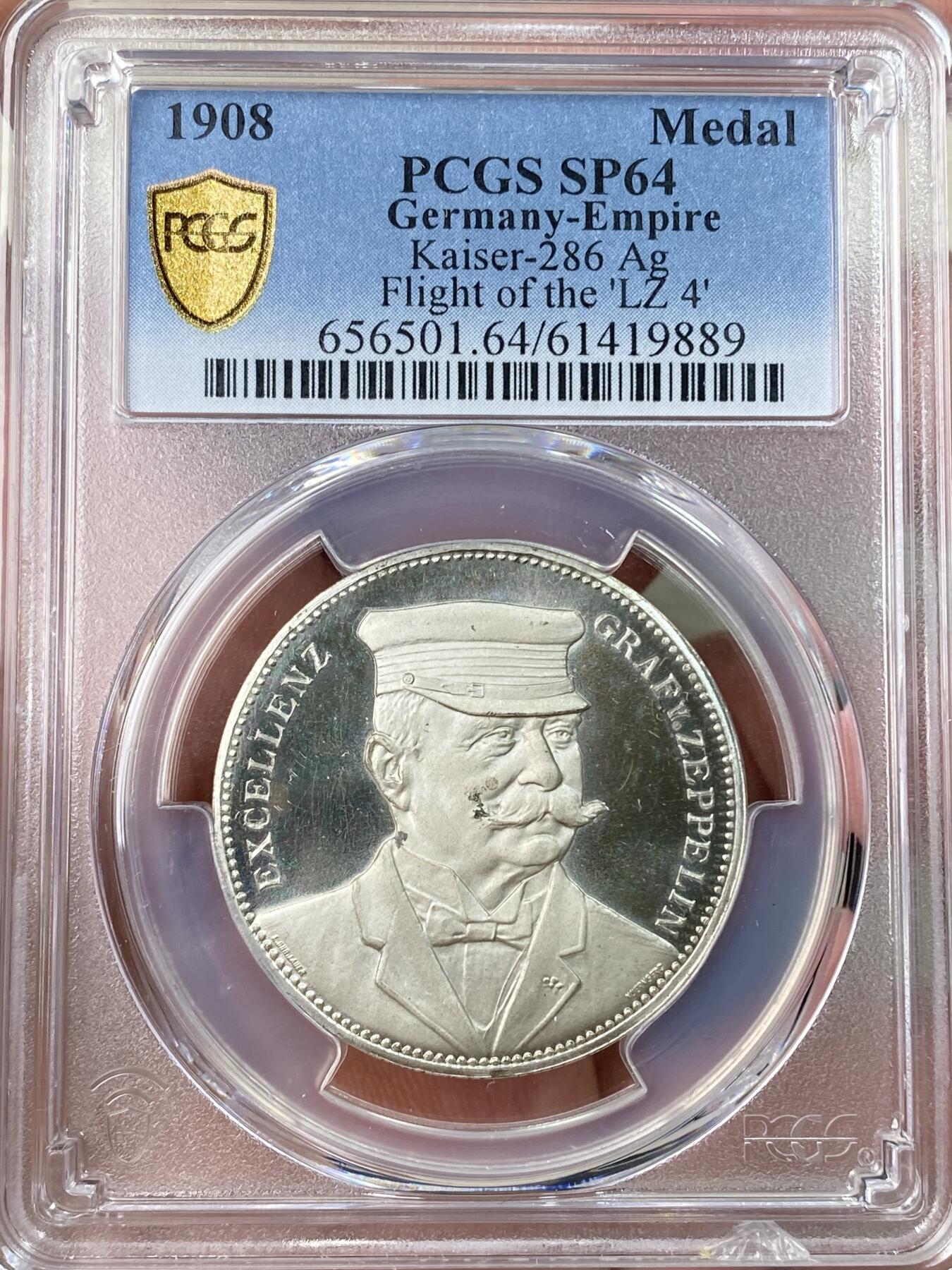 万国钱币拍卖第062期 PCGS SP64 1924年德国齐柏林伯爵齐柏林飞艇飞越斯特拉斯堡纪念银章 齐柏林飞艇银章很多 带帽正面像配斯特拉斯堡景观罕见 通体超深度精制镜面喷砂顶级工艺