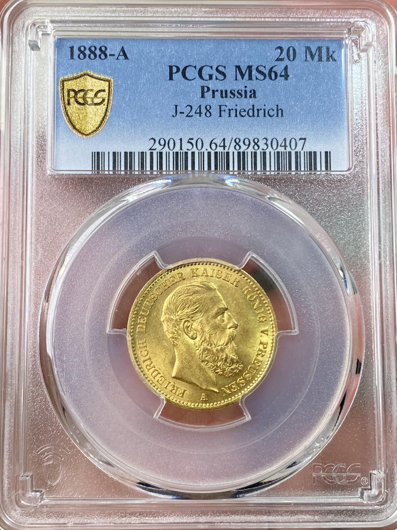 万国钱币拍卖第062期 PCGS MS64 1888年德国普鲁士三皇之年腓特烈三世短翅流通20马克金币 单年发行三皇系列名誉品种 丝绸黄金转光底板邮票质感 高分越来越难的品种 顶级典藏品质 7.96g 900金